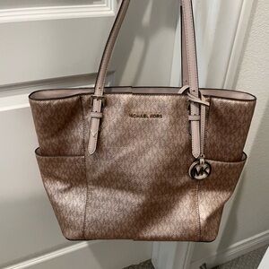 Rose gold Michael Kors purse